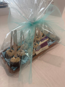 Cookie Dough Pops on wood tray